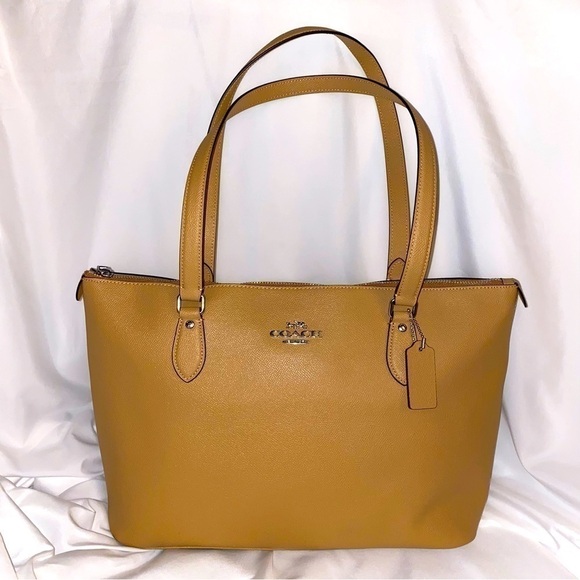Coach Handbags - Coach Leather Tote Brand New/w Tags 15” Top Zipper Leather Bag in Latte Color
